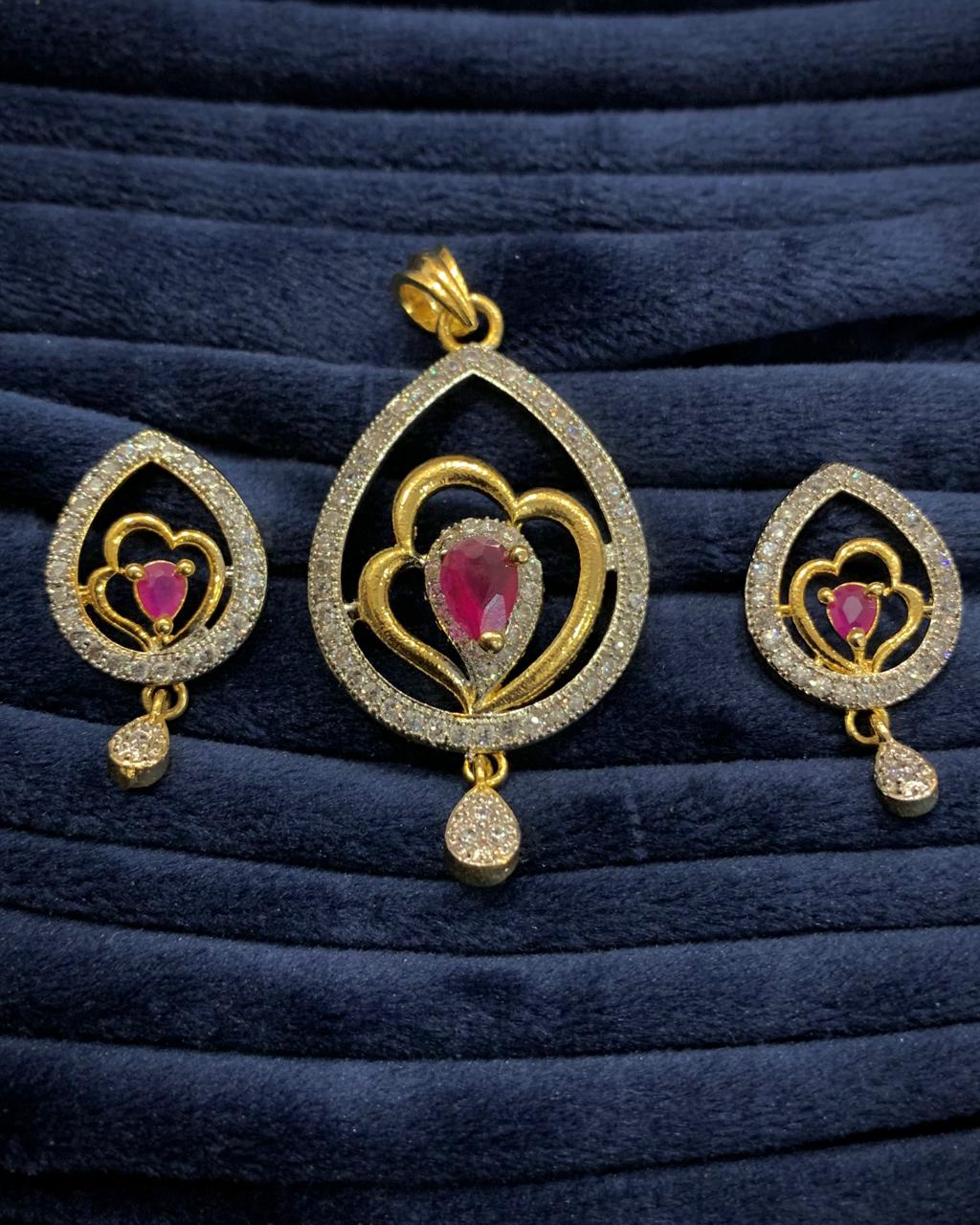 Golden AD Pendant With Magenta Stone