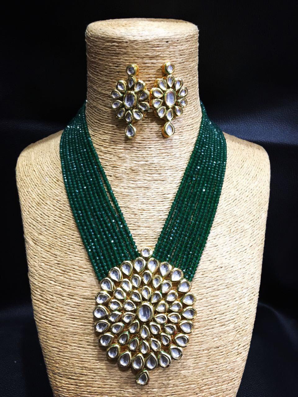 Beautiful Kundan set with green onex