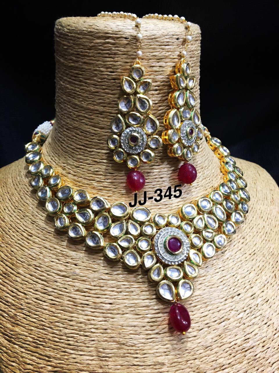 Kundan choker set with red moti