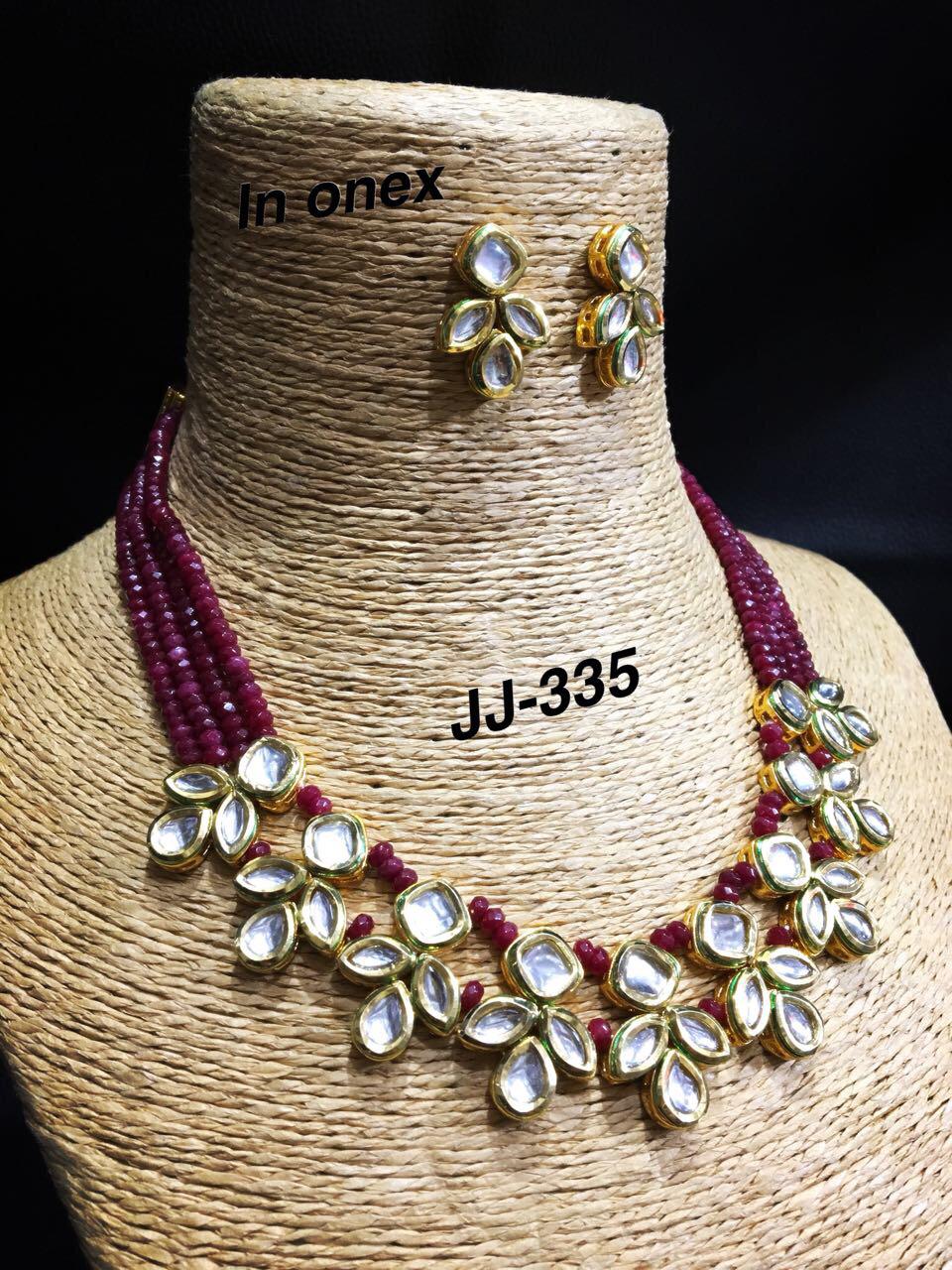 Beautiful Kundan set with red moti