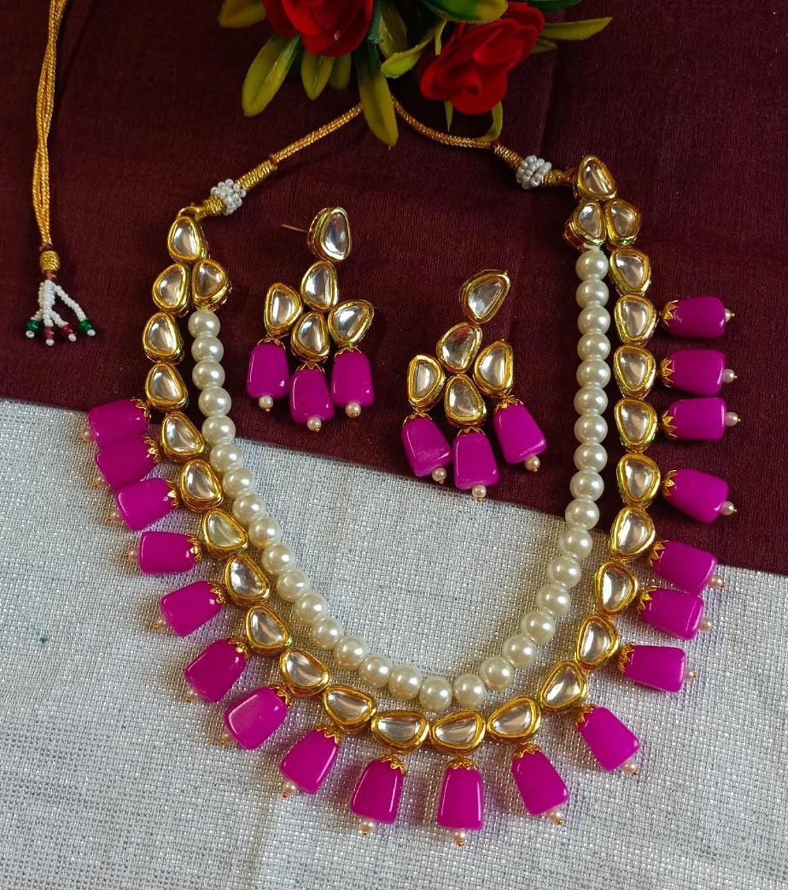 Kundan set with white and Magenta beads