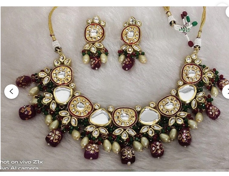 Beautiful Kundan set in maroon color
