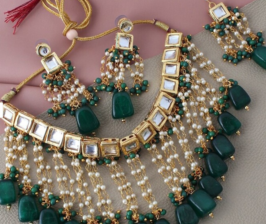 Kundan set  with white moti and green beads