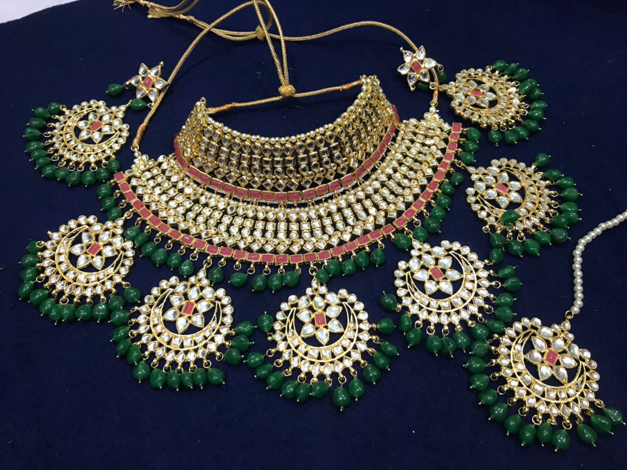 Semi bridal kundan set with green moti