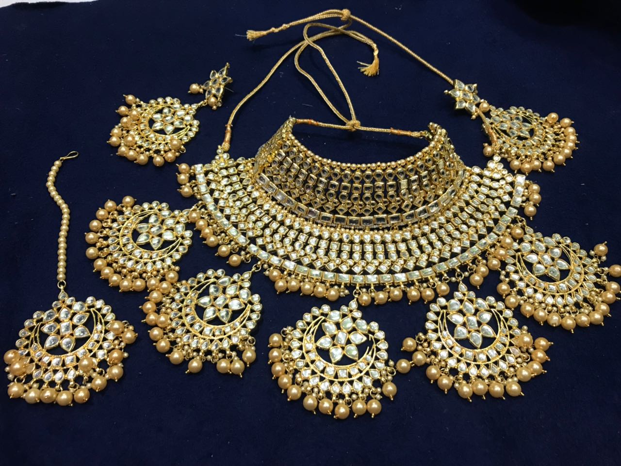 Semi bridal kundan set with golden moti
