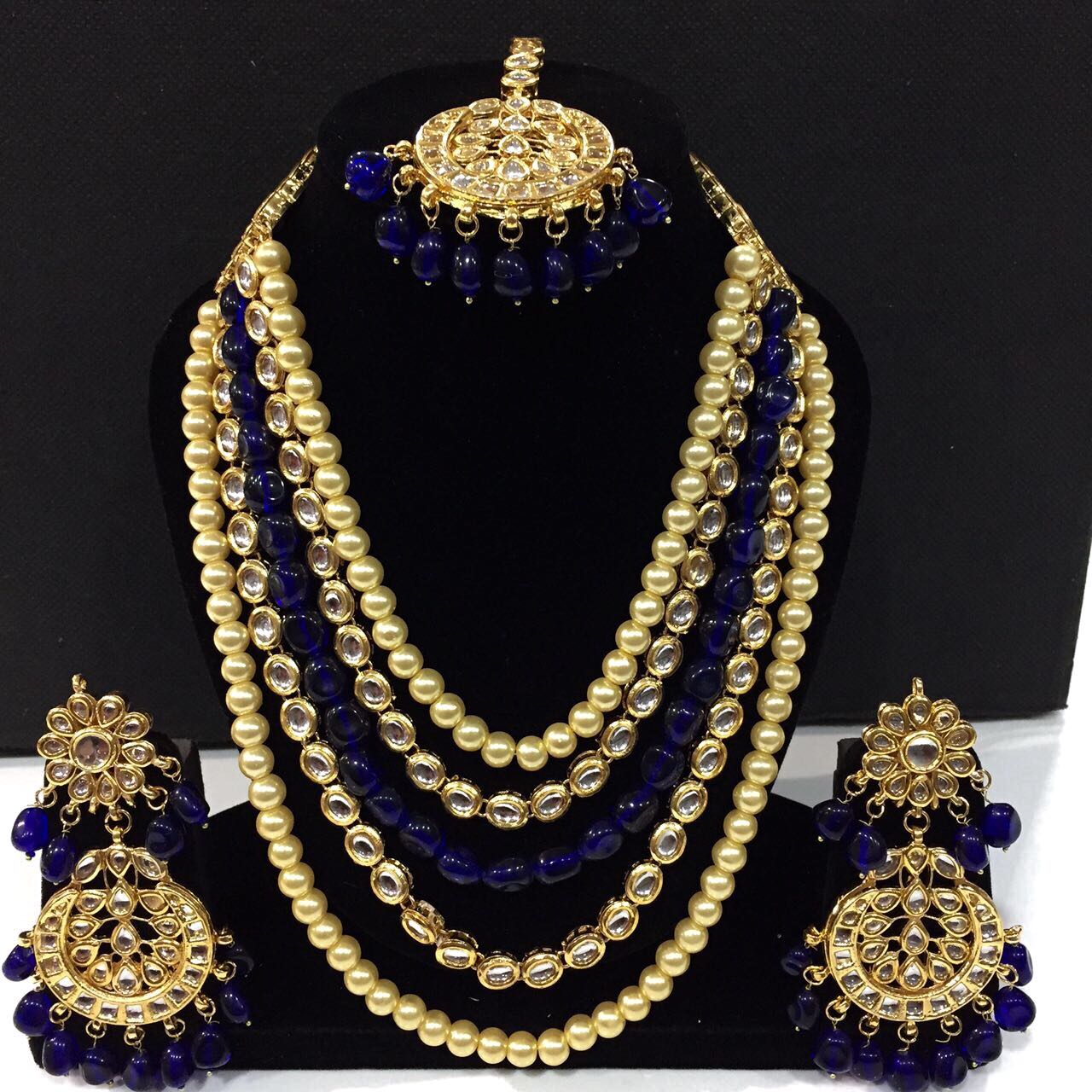 Kundan set maang teeka with golden and blue beads